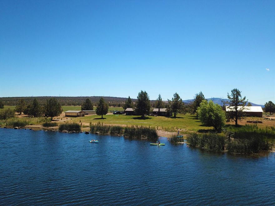 This 257± acre ranch, located in the highly desired Powell Butte, has so much to offer! An excellent cattle and hay ranch with two homes, a private lake with great bass fishing and142± acres of COI irrigation under 3 pivots, 3 wheel lines and only a few handlines. The large shop 
is well insulated and includes an office and plenty of room for your equipment and toys. With two large hay barns, a nice three stall horse barn, cattle working corrals and a covered hydraulic squeeze chute. This working ranch has everything you need! Relax at the end of the day lakeside, taking in the breathtaking views of the Cascade Mountains.