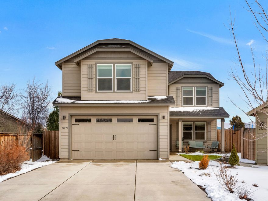 This spacious home in Marketplace boasts a spacious floor plan on a larger lot that backs the canal for privacy...you will be the envy of all your neighbors. Built in 2015, the main level features an open great room concept, roomy kitchen with solid surface counters, warm living room w/ gas fireplace, powder bath, and spacious home office. Upstairs maximize the flexibility of this well designed floor plan: on one wing features a large primary suite w/ bath, 2 additional bedrooms & another full bathroom. Situated at the front of the house is a second primary suite suite or bonus room with Cascade mountain views. This oversized lot is a gardener's or entertainers dream, including a lovely covered patio. Enjoy the panoramic sunrises and sunsets from this special property.