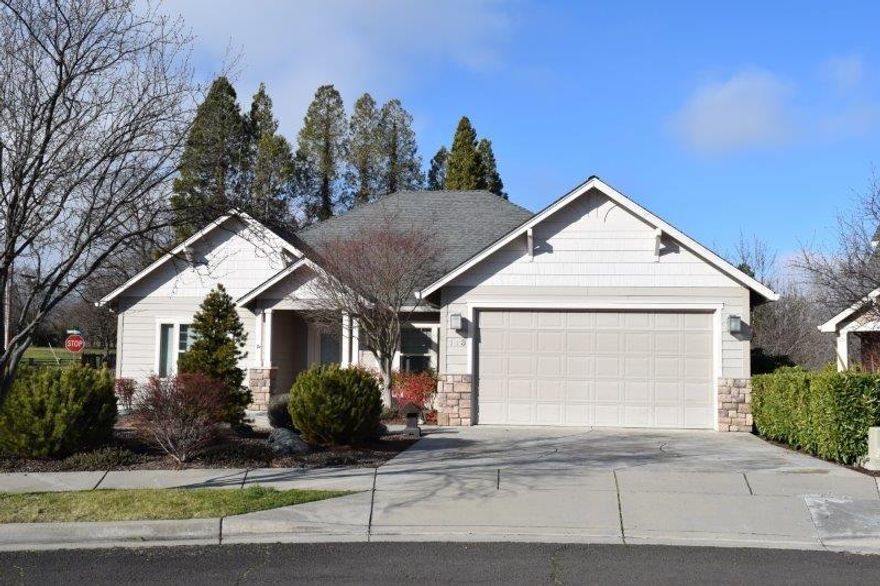 Beautiful home with many upgrades and custom features. Meticulously maintained! Open floor plan, large great room, wood floor, coffered ceiling and gas fireplace open to dining room and dining area off the kitchen. On one side of the home is the large master suite with coffered ceiling, large master bath with dual sinks, soaking tub, and large shower. The toilet and bidet are in a separate room also a huge walk-in closet. On the opposite side of the home are two spacious bedrooms and large bath. Kitchen features granite counter tops, large pantry and all the appliances are included. Laundry room with a sink.Finished, carpeted garage with nice cabinets included. Beautifully landscaped yard recently maintained and ready for spring with automatic sprinklers and a deck above off the kitchen. Just steps away is the Bear Creek Greenway, a 17.9-mile biking and hiking path extending from Ashland to Central Point. 1 mile to the beautiful Paschal Winery. All this and only 5 miles to Ashland