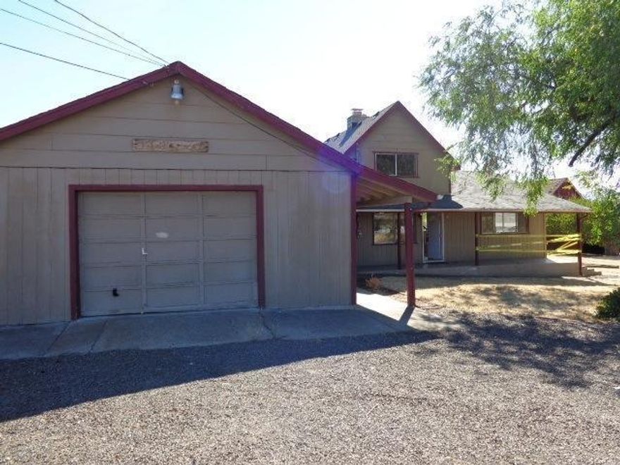 Large farm property on 18.89 acres with two story ranch home featuring two master suites, with sprawling pastoral views and a large fenced in ground pool area. Easily accessible property with large barn. Large equipment turn-around area. Irrigation on almost entire property. Convenient to everything. This is a Fannie Mae HomePath property.