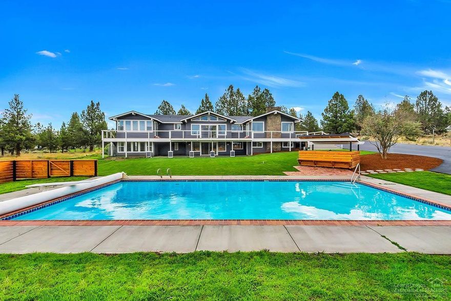 Custom remodel on this stunning Tumalo estate set upon 5 beautiful acres with breathtaking mountain views! Home has been thoughtfully & tastefully remodeled and features a gourmet kitchen, inviting family AND living rooms, a large bonus room downstairs as well as a wood-wrapped game room with professional built-in bar featuring keg taps, soda machines, refrigerators, and more! Large wrap-around deck overlooks the new landscaping and heated swimming pool with diving board & lounging deck! Don't miss this spectacular opportunity for FAR less than replacement cost!