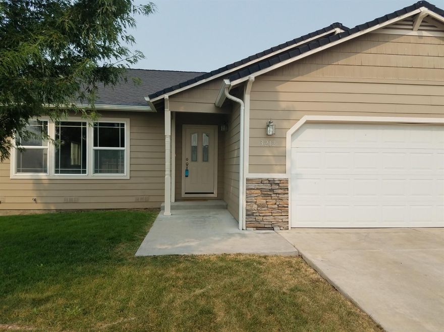 Big corner lot with room for RV parking. There is fresh paint throughout with vaulted ceilings and open floor concept.