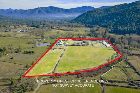 Photo of 320 Caves Camp Road, Williams, OR 97544 (MLS # 220214897)