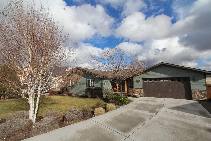 Custom built single story home in 2005 on spacious lot in Klamath Meadows East. 3 bedroom 2 bath rancher has no neighbors behind, and fully fenced backyard. Covered porch leads to functional entry with closet. Open floor plan has separate dining, kitchen with Corian counter, Craftsman cabinets and garden window plus vaulted great room. Cherry colored oak floors. Master features walk in closet, Corian counters and double shower head. Laundry room with counter and cabinets. 2 12 X 12 bedrooms and additional bathroom with tub/shower combination. Beautiful backyard has fenced dog run, chicken coop with pen, greenhouse, fenced garden area, covered patio and adjacent deck. Graveled RV parking. This is a lovely home.