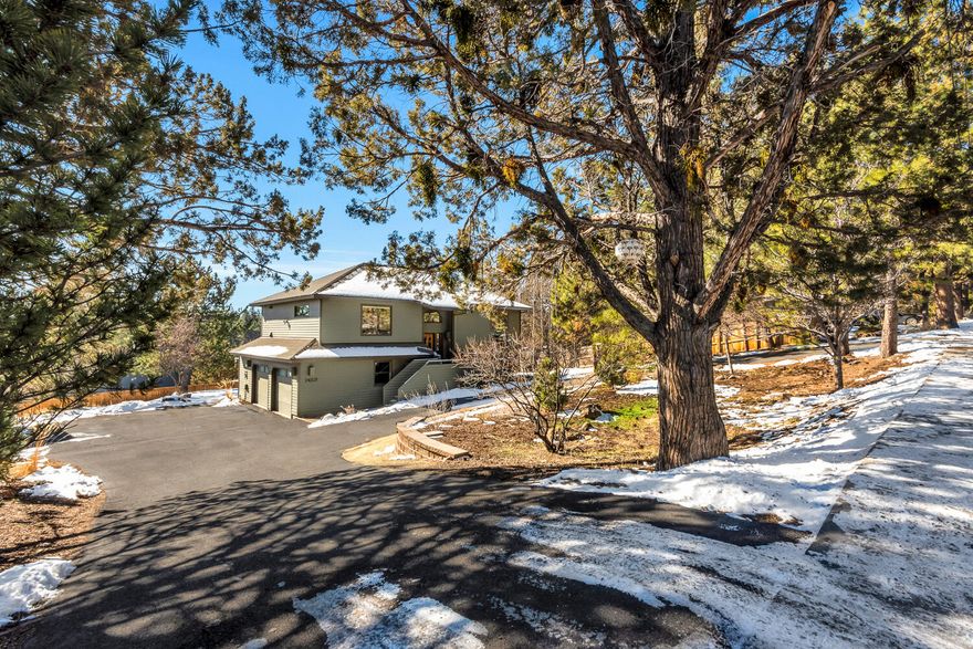 Beautifully renovated home sits well off Portland Ave & is perfectly perched w/ panoramic views to the South. The front door opens into the entry w/ cherry wood stairs that bring you into a quality & fully updated home filled w/ abundant natural light throughout. Upper level offers a great room with vaulted ceilings, gas fireplace, gourmet kitchen w/ granite countertops, Heath Tile, stunning clear vertical grain fir cabinetry, generous island & pantries, & adjoins a comfortable bonus room w/ half bath. The primary suite's warm bathroom provides a soaking tub w/ tile walls & floors, skylight & organized walk-in closet. Lower level has 2 bedrooms, bathroom w/ full tile shower, laundry room w/folding table & hanging bar, access to 2 car garage w/ bonus storage nooks, & access to a spacious outdoor patio. Potential to build a 22x22 ADU (see plans). Plenty of parking, circular driveway. Close to Newport Market, Drake Park footbridge, Harmon Park, Galveston & Newport corridors,  a must see!