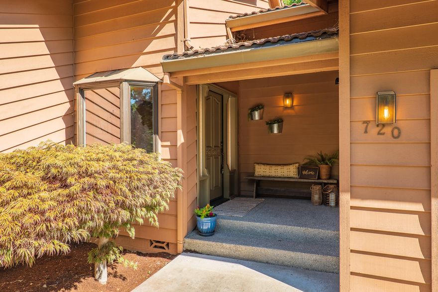 Luxury and a peaceful oasis on the river awaits you when you come home to this fabulous property.  This beautiful home features soaring ceilings and massive windows to take in the view of the river in the living room and master suite.   A kitchen any cook would love with breakfast bar and island opens into a dining room and out onto the spacious deck with steps down to your own private beach.  Master suite with tile shower, dual sinks and plenty of storage and two more bedrooms for your guests and guest bath round out the main home.  The detached artist studio has newer hardwood floors, 1 bedroom/ 1 bathroom and a wall of sliding glass doors as well as a sweet deck to enjoy the amazing garden that awaits right outside complete with Gazebo, Koi pond, paths that meander and benches to relax on.  Once you lay eyes on this beautiful property you will see why it was featured on the garden tour for many years.  Truly a special place and one you don't want to miss.