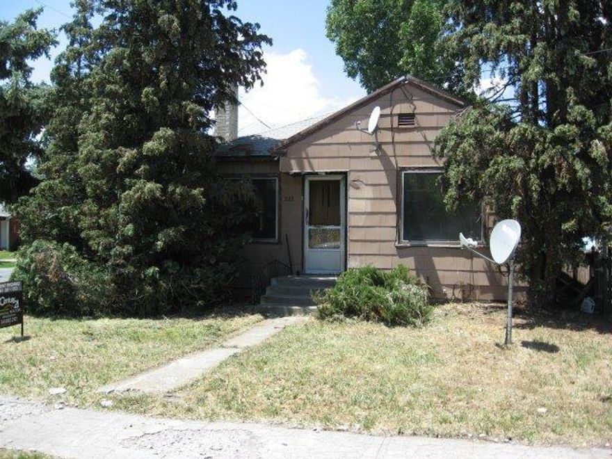 Solid home located on a nice corner lot. Good floor plan. With a new roof, some paint and carpet this home will be as good as new. Don't miss the 325 square foot finished storage room behind the carport. Great price for this home.