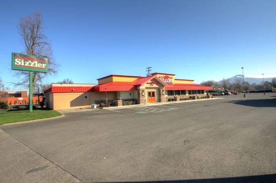 Great Commercial building in an outstanding location! This 5061 square foot single story building was built in 1978 and has had numerous remodels over the years. It is situated on an acre with approximately 85 off street parking spaces. This superb building is located on a very busy boulevard in East Medford with 2016 Traffic Counts of 15,700/day. Currently being used as a restaurant, but could easily be converted into a number of other uses, such as retail, offices, or call center.