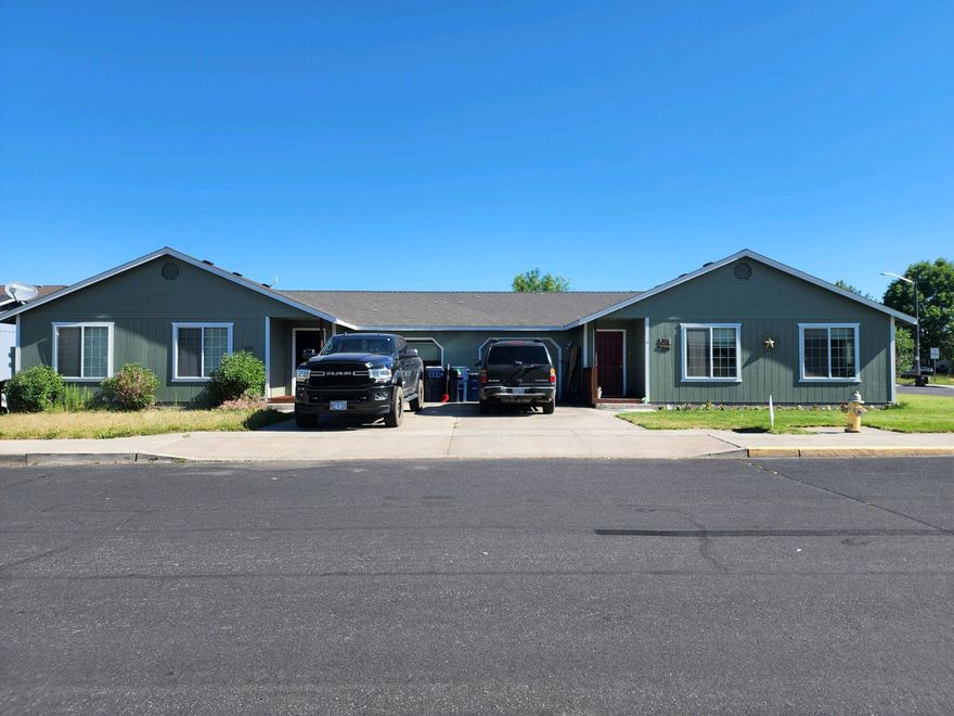 Investment opportunity! Well cared for single level duplex with single car garages. Open floor plan with vaulted ceilings make these units feel spacious.  Walk in closets in the primary, w/d hook ups in the garage.  Several updates in the past few years, Unit 1: New flooring, appliances, some light fixtures, blinds, window trim, paint and new stain on the porch.  Unit 2; New paint , porch stain and blinds, and completely painted outside fall 2018. Both are landscaped front and back and have auto sprinklers.
Fenced with rear yards featuring patios on each side. Great location convenient to shopping, Umatilla Sports Complex &. Easy access to Hwy 97 & Redmond airport. 
Tenants are responsible for all utilities.
Update:  New stainless appliances on order for 2757.