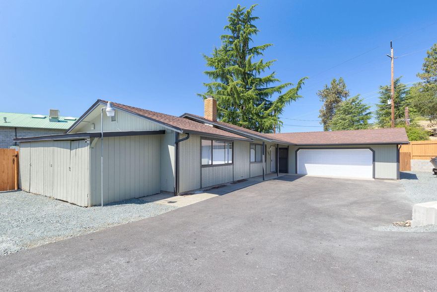 Welcome to 1696 NE 9th St! This charming home offers a spacious 1560 sqft with 2 bedrooms, 1.5 bathrooms, open concept, & an abundance of natural lighting. Some recent interior upgrades include new interior/exterior paint, flooring, countertops, & a gas fireplace. Some exterior features include RV parking, oversized garage, raised garden beds with irrigation, & low maintenance rock. Come see this one before it's gone!