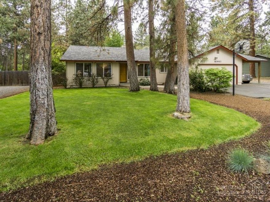 Amazing park like setting on .32 of an acre. This 1310 sq ft home is nestled in the ponderosa pines on a quiet street. Pride of ownership is evident in the care of the home. The large living room looks out to the lush green landscaping. The master suite has a master bath as well as a walk in closet. There is enough RV parking for 2 RV's as well as a carport and garage. Please call to arrange a showing!