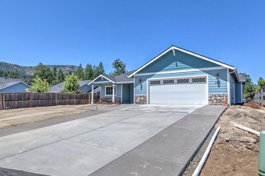 This is the very last new construction home available.  The 2 story building has been demolished and the beautiful Redwood 1810sqft. floor plan is custom designed for this spacious lot, just a short distance to the Illinois River!  Featuring vaulted ceilings, finished 2 car garage, large kitchen pantry, custom built cabinets, stainless steel appliances.  The home also includes a propane range, fireplace, front and partial back landscaping.  Pomeroy River Estates is a local hidden gem with highly desirabe river access for swimming, fishing below the dam and enjoying the mountain views!  This community is close to town and has that peaceful country feel. The community also offers a secured RV paring area for your recreational storage needs.