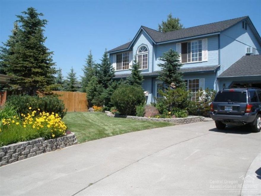 Cul-de-sac beauty. Wonderfully maintained 2 story home featuring 3 bed, 2.5 baths, with family and great room, pellet stove, newer countertops, carpet, roof & hot water heater. Beautiful mature landscaping with assortment of trees for privacy. Paver patio plus small RV parking.