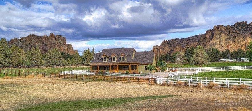 With Smith Rock views out your back door you will enjoy all that this custom built home has to offer. From the tongue & groove vaulted ceilings to the Marvin wood windows & solid wood doors you will find quality features throughout. Granite counters, travertine floors & more. Large master suite down, 2nd master up as well as 2 other bedrooms. Formal dining, den/office & a bonus room plus lots of storage. 3 car garage + a 33x33 shop/barn. Fully fenced with underground irrigation system & a water feature.