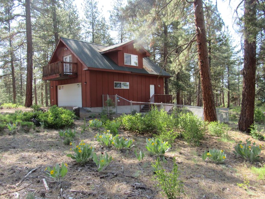 25 acres of Ponderosa Pines, thinned & managed, Sprague River views from bluff-all within 1 mile of Chiloquin.  Built in 2006, this concrete slab garage with open living area above. Full bathroom on 1st level with stairs to the 2nd level..  One room with kitchen area, sleeping area-all you need to recreate in this area of great fishing, hunting, close to Chiloquin amenities like the Wood, Williamson and Sprague Rivers, Crater Lake Nat'l Park, Klamoya Casino, local restaurants and shops.  Lots of room to build your larger home on the bluff overlooking the Sprague River below.  Property line is close to the Sprague River and USFS adjoins to the river so you would have full river access-but it is steep! Plenty of public boat launching. Unique because of the size and beautiful forest but also it is close to town.