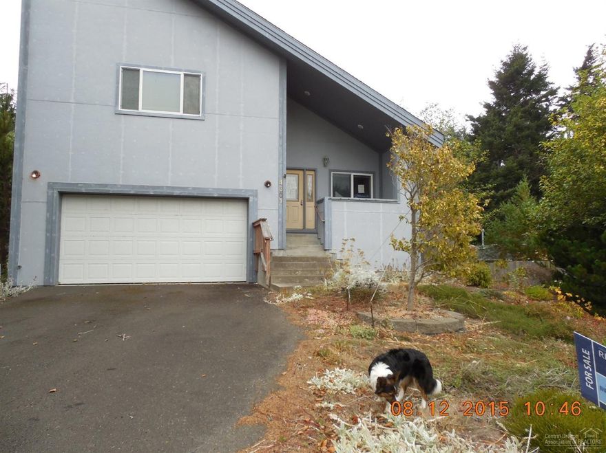 Beautiful Bay views in this spacious open floor plan home located in a quiet and fantastic neighborhood on a hill overlooking the bay. It has a big 484 sq ft garage and a big wooded lot. The home needs some work but compared to other homes on the market this home is priced ultra competitively.