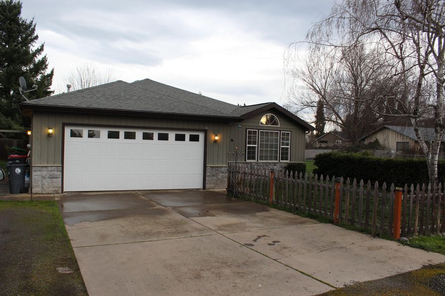 Come tour this hard to find 4 bed 2 bath home with room for RV parking on the side. This beautiful home has laminate flooring in the hallways, kitchen and dinning room. Vaulted ceilings in the living room and granite countertops in the kitchen. The back yard has lots of potential with its large deck, nice tool shed in the back and wired for a hot tub.