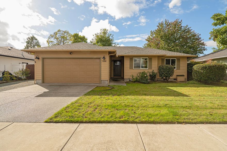 Welcome home to this beautifully updated home in Grants Pass! Nestled on a very private street, this home has an open concept floorplan. This 3 bed, 2 full bath home features all new luxury vinyl plank flooring in all living spaces. Kitchen features new granite countertops, new lower cabinets, pantry, and breakfast bar. Walk down the hallway to find laundry/utility closet and all bedrooms. Bathrooms have been tastefully updated with new tile flooring. Primary Suite offers walk in closet and shower. Large windows throughout allow abundance of natural light! New interior paint and finished garage with tons of storage round out this great home! Landscaped yard with sprinkler system and pergola. As a bonus, there is a large shed and additional space for parking and raised garden bed. This home is a must see!