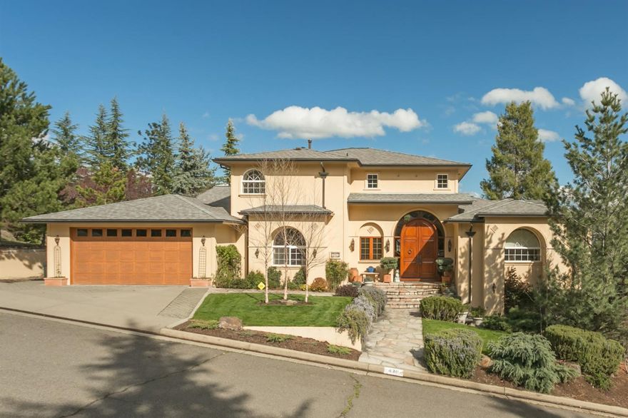 Classically elegant yet warm and welcoming, this exquisite home is perfect for entertaining; from the dramatic entry and grand staircase to the gourmet kitchen with huge center granite island, 2 separate sinks, Thermidor gas range, sub zero fridge, to the spacious formal dining room and covered veranda for comfortable outside gatherings. This home has EVERYTHING for the discerning buyer. There are spectacular valley and mountain views from every window. The morning sunlight streams into the kitchen. The luxurious master bedroom suite features a spa quality marble bathroom with separate shower and jetted tub. The 20 X 40 palatial pool is surrounded by gracious, mature grounds affording privacy and the feel of a relaxing resort including the soothing sounds of a fountain. And there's a pergola for shade, too. The separate 1026 sq. ft. 1 bedroom 1 bath guest apartment is light filled and spacious with separate outside entrance and is included in the total square footage.