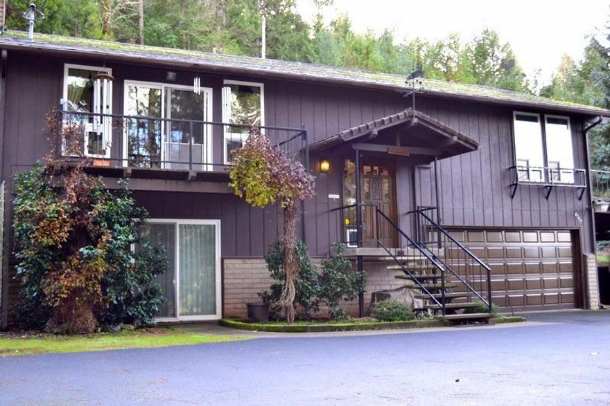 This one has it all! A well built home on nearly 5 wooded acres. Lots of quality here for the price. Open beam ceilings and two master suites. Comfortable and well cared for home includes gas fireplace and gas stove for back up heat. Also Includes covered RV parking as well as additional carport so total covered parking for 4 cars plus RV. Sits at the end of a shared private drive.