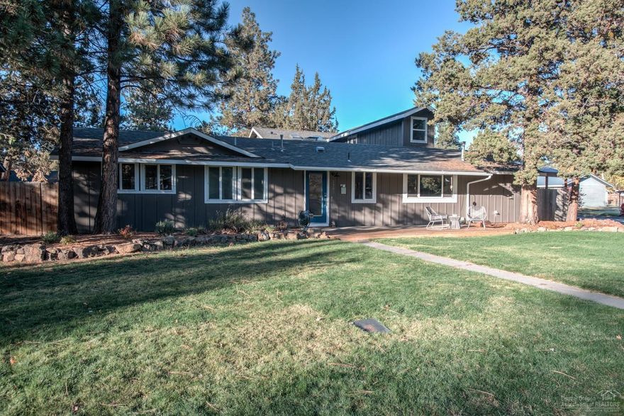 Looking for a hidden gem in the heart of Bend! Well look no further than this wonderful 4 bed 3.5 bath single family updated mid century modern home. Endless opportunities in the Midtown charmer that is a block away from Bear Creek Elementry with a recently updated mother-in-law suite. This home offers a large master suite with heated floors in the bathroom, a heated shop/garage, fenced in yard with paver patio, stainless steel appliances, two washer/dryer hookups and a new front deck. A great outdoor space for sitting by the fire pit or warming up in the Jacuzzi. This unique house would be a great full time home, rental option, or both! This house is a must see!
