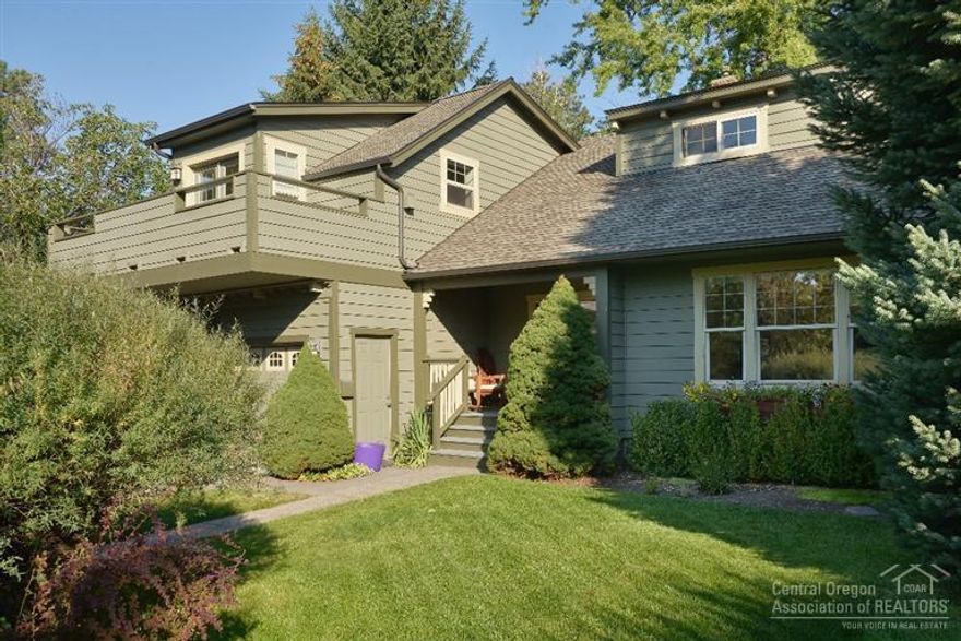 Can convert to duplex. Walk to Drake Park, library, downtown Bend restaurants from this charming home in one of the most desirable Bend locations on large RM lot w/ a rare attached over sized double car garage. Nice older arch. details combined w/ a lovely new master addition including a walk in closet,balcony and fire place.Updated kitchen, beautiful wood floors. Property is large enough for an ADU. Seller carry possible. Packet with conversion plans attached to listing.