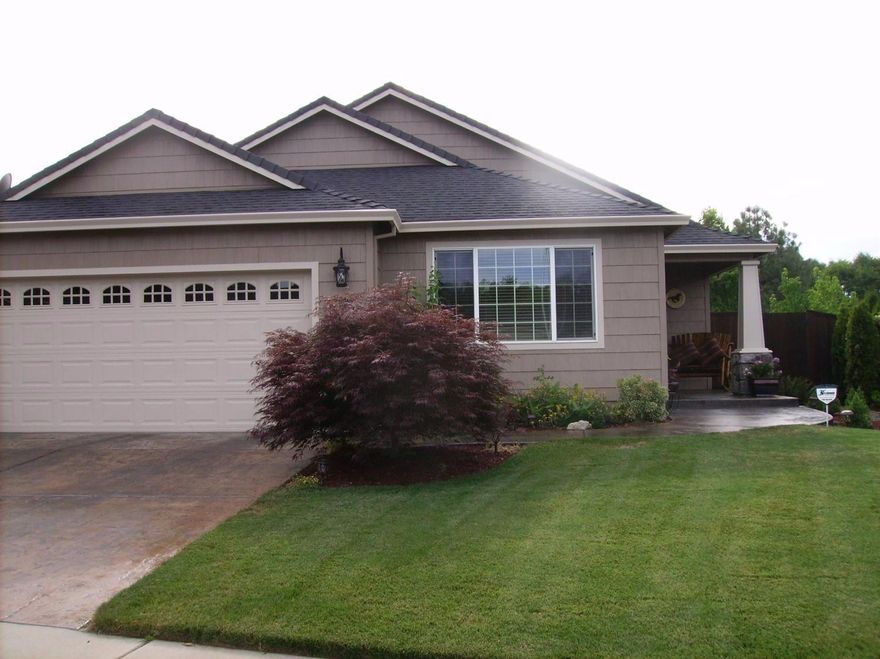 Immaculate, amazing-better than new home in desirable Glenwood Subdivision. Quality construction; the pride of ownership will get everyone's attention. Open floor plan with separate master suite; High-Lights the well appointed interior amenities. Granite kitchen counters, pantry, all kitchen appliances stay. Hardwood & tile floors, gas fireplace, vaulted ceilings with fans, plant shelves. Large Master Bedroom with its own vaulted ceiling, walk-in closet & door opening to wonderful private covered patio & attractive backyard. Large laundry room. Spacious bedrooms, one currently used as a den. Covered, spacious front & back porches (with fan) & driveway are stamped/sealed concrete & very attractive. Private backyard includes beautiful plants& trees, Hot Tub, RV paved pad with double gate entry. New paint, inside & out. Finished garage w/ work bench and shelves. Lovely location on east side & part of Eagle Point Golf Course Community; nearby evergreen tree covered knoll & Lucas Park with