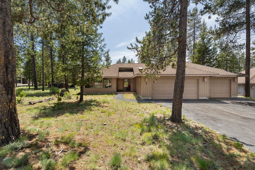 Welcome to your Sunriver getaway! This single-level, 3-bedroom, 2-bath home offers an open, vaulted floor plan filled with natural light from expansive windows. The generous great room is perfect for gathering, complete with a cozy wood-burning fireplace to warm chilly evenings. With nearly 1,500 sq. ft. of comfortable living space and a rare 3-car garage—uncommon for homes this size—you'll have room for all your gear and toys. Each bedroom and the main living area feature sliding doors that open to the spacious deck, creating seamless indoor-outdoor living. The large deck includes an enclosed hot tub—an ideal spot for relaxing and taking in the beauty of nature and local wildlife. Backing to a spacious common area, and with easy access to the north end of Sunriver, including the Cottonwood entrance, new dog park, and nearby amenities. Sold fully furnished with SHARC paid, this home is ready for your personal touch. Start making memories in Sunriver today!