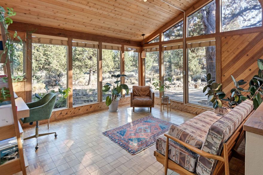 Don't miss this rare opportunity to own a 1.12-acre lot in the highly desirable JD Ranch Estates. Located on a quiet cul-de-sac just minutes from town, this Mid-Century style home offers privacy, space, and convenience.

The main-level primary suite, spacious remodeled kitchen with all new appliances, and light filled sun-room provide a comfortable and functional layout. Both bathrooms have also been beautifully remodeled for a fresh, modern feel. Additional highlights include a private outdoor sauna, cozy wood stove, and many upgrades such as a Payne heat pump, energy-efficient vinyl windows, and a heat pump water heater.

Enjoy beautiful trails right out the back door to public lands and a newly fenced area of approximately 1/4 acre, perfect for pets. Also be sure to check out the rock climbing wall in the garage!

JD Ranch Estates features over 4 acres of common space with tennis and pickleball courts. Just minutes to Pine Nursery Park, east side dining, shopping, and schools