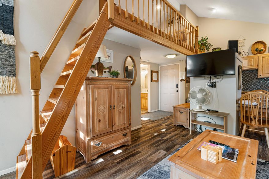 Not all Powder Village condos are created equal, and this turnkey, fully remodeled upper-floor unit stands out in the heart of the Sunriver Business Park. The main living space offers comfort and style, featuring updates throughout and a newly remodeled bathroom with a walk-in shower. The repositioned staircase maximizes the usability of the entire loft space, making it ideal for relaxation or accommodating guests. This delightful condo offers unparalleled access to local amenities including paved bike trails, Sunriver Village, and the Mt. Bachelor Resort. Owners and guests can also enjoy the outdoor pool and hot tub, exclusive to the condo community. Unit #D3 is right next to the pool and laundry making it super convenient. The homeowners association covers water, trash, sewer, landscaping, swimming pool maintenance, and snow removal, making it a perfect entry-level Sunriver vacation rental, 2nd home or primary residence.  Sold furnished.