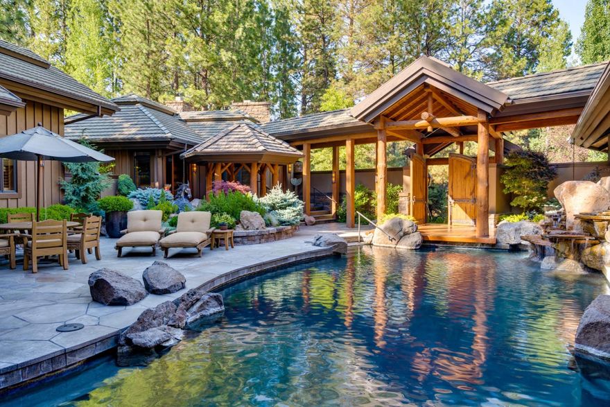 WELCOME TO CASA MONTANA
This Broken Top beauty is situated on the premiere, Weiskopf golf course in Bend, Oregon. Upon entering the doors of Casa Montana, you are greeted by a private courtyard with a serene pool, a flowing water feature, and an outdoor spa. The tranquil, poolside patio offers the perfect space for lounging or entertaining your guests. Combining stately spaciousness with cozy elegance, this spectacular home offers 5 master suite bedrooms, 5.5 baths, and 8 fireplaces. With high ceilings and wood beams, this gorgeous residence is offered turnkey including furnishings and art - right down to the silverware. Overlooking the courtyard is a separate, 1,000 sq. ft. guest residence and gym tucked away just steps from the pool and spa. With lush landscaping, harmonious garden sculpture, and a large, terraced outdoor deck overlooking the golf course, Casa Montana is a must-see property.