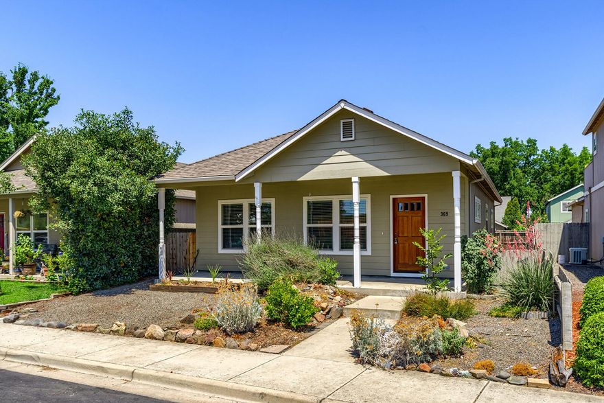 This low maintenance single story home is light & bright with a great open floorplan. The house includes a large covered front porch, beautiful new laminate plank floors throughout most of the house, a spacious kitchen w/ abundant cupboard space, & a Jenn Air downdraft range , all open to the living & dining areas. The house offers a split floorplan w/ two bedrooms & a full bath off of the LR & a large primary bedroom at the opposite end of the house w/ a on suite bath w/ double sinks, abundant storage, & a large walk in closet. The laundry rm has built in cupboards & the attached two car garage is accessed from a quiet rear alleyway. The rear yard is fenced w/ a patio & a small deck. The subdivision includes a small park w/ a lush lawn & large shade trees. The property is located less than a block from the Skyrman Arboretum, a City park w/ plans for walking trails. Across the street a new subdivision is being constructed, providing instant equity upon completion of the new homes.