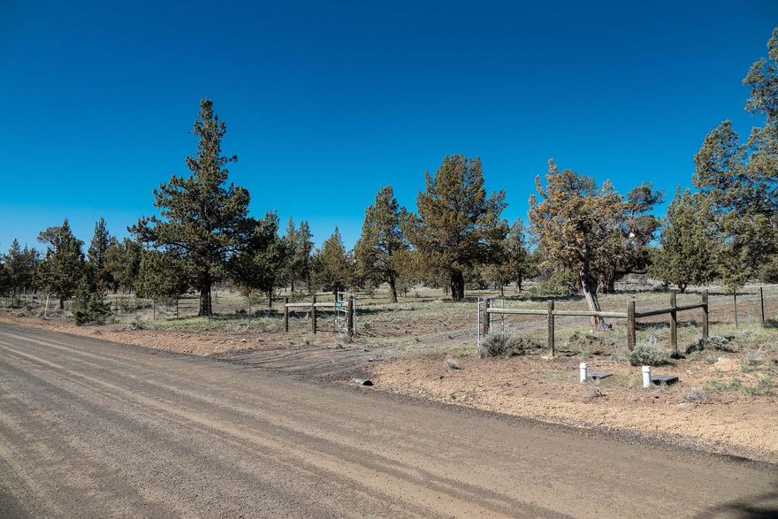 Crooked River Ranch...No need for guarded entrances.  No traffic problems.  No crowded tracts.  Just the warmest, most honest place this side of the Cascades!  5.16-acre lot, that is fenced and gated!  Community water is available at the road, which will be much more economical than drilling a well.  Septic is approved and power is available!  Just bring your toys, your critters and your floor plan.  There is plenty of room to build accessory buildings to your hearts content!  If you can't wait to build, place your manufactured home on site from one of the local dealers in Redmond!  Property has primitive driveway that will be adequate for your contractors, so they can ''hit the ground, running''!  I saved the best for last....Seller is offering some fabulous ''Owner-terms'', so there won't be a lot of ''out-of-pocket'' expense to get your started.  Call listing agent for the details!