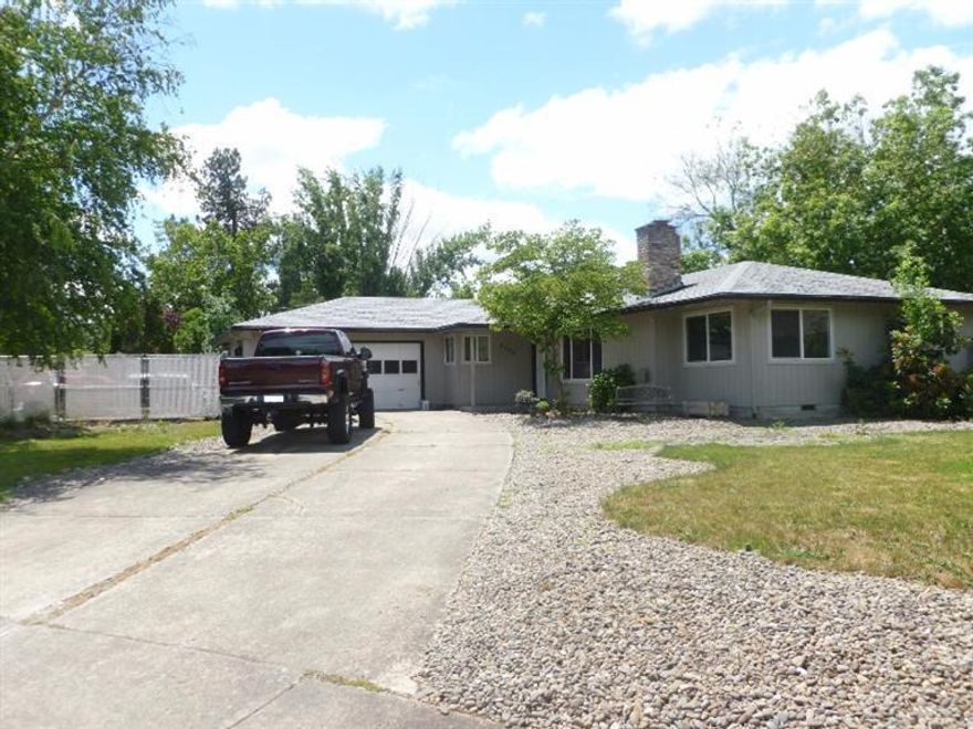 Fantastic location in a quiet cul-de-sac of nicely maintained homes. Sits on a huge .35 acre lot with a ton of fenced off RV Parking area for your toys, cars, & more. This larger home offers a formal entry opening to a spacious living room with a wood burning fireplace and large dining area that could be used as an additional living area. Kitchen has extra room for a breakfast nook area. Nice sized laundry area with an extra half bath. Enjoy the fantastic large fenced private back yard & patio with a larger mature trees. 2 Car garage with oversized driveway in addition to the RV parking area. The home has newer windows but could use a little TLC to make it your own. Seller is a licensed real estate broker in the State of Oregon.