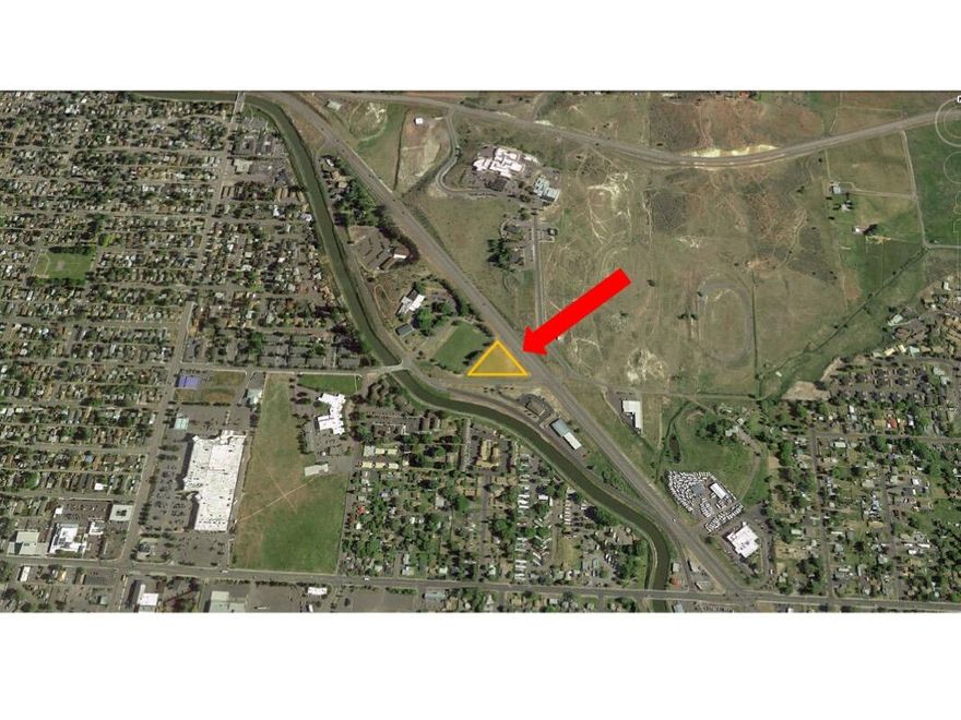 Commercial lot in high exposure location along Crater Lake Parkway. Adjacent to main thoroughfare coming in from Reno from the South and from Bend Oregon from North. Great location for a variety of commercial uses in this high traffic area. City/County utilities available. Close to shopping centers and the YMCA.
Buyer to do own due diligence to determine highest and best use..
