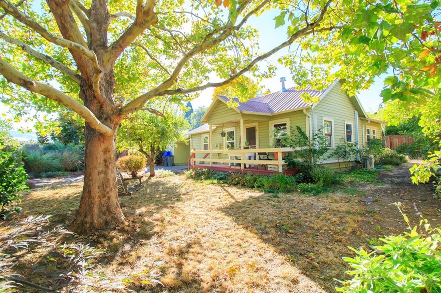 Beautiful and updated cottage on nice private lot ( 2 tax lots). Upgrades include newer mini split heat pump,kitchen cabinets, attic insulation, vinyl windows, refinished wood floors, gas heating stove. Two bedrooms and two baths, tile bath. This is a great entry level home or rental. Nice private yard with mature trees. Carport and small storage shed. Located close to the bike path and all school levels and shopping. Light and bright and turn key condition.