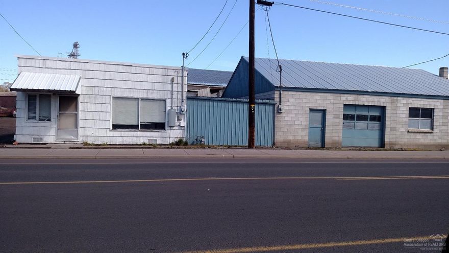 Cute little 864 Sq. Ft house that has been updated inside. Very livable. Amazing concrete 20x30 block shop with 3 phase electric, gas heat and storage above. Great home and business opportunity, or use the house for an office.