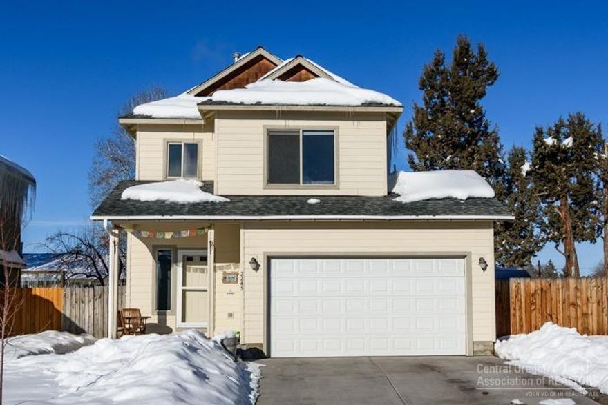 Adorable home in Redmond! 1236 sq ft home with 3 bed/2.5 bath with mountain views. Open floor plan! Kitchen features deep granite composite sink with disposal, breakfast bar and lots of cabinet space. Kitchen overlooks living area with gas fireplace with custom mantle. Updated lower level bathroom with new luxury vinyl floors, sink, vanity and mirror. Light and bright house features lots of storage space. Backyard has large concrete patio, fenced back yard and additional side of house parking for boat or small RV. Short drive from Bend and everything Redmond has to offer.