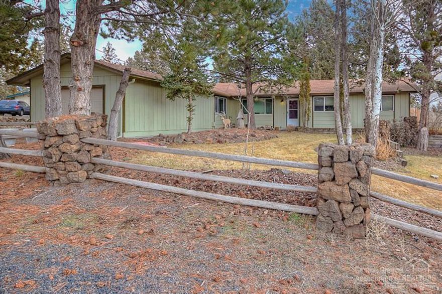 Enjoy Mountain Views from this NE Bend rambler on a 3/4 acre lot. Move in ready home, 3/2 w/bonus room in converted garage. Lg living & dining areas, galley kitchen w/slider to patio & park like back yard & garden. Spacious bedrooms, new carpet & paint, roof & HVAC. Plenty of space for RV's & a shop! Fully fenced w/mature trees & landscaping w/auto sprinklers. Wired for hot tub & the storage building is included! Lot could be subdivided in future.