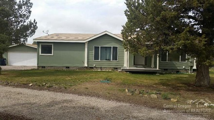 Spacious neat & clean home w/an open flr plan & majestic mtn views! This home is light & bright w/vaulted ceilings thru out. The kitchen makes it easy to entertain w/plenty of cabinets for everything & includes an island, new dishwasher & large pantry. There is space to park your RV w/power & all your toys on this 5 ac parcel. You're sure to enjoy relaxing on the private back deck while soaking in the views. The master has a large soaking tub & an oversized onsuite that has 2 separate counters w/sinks.