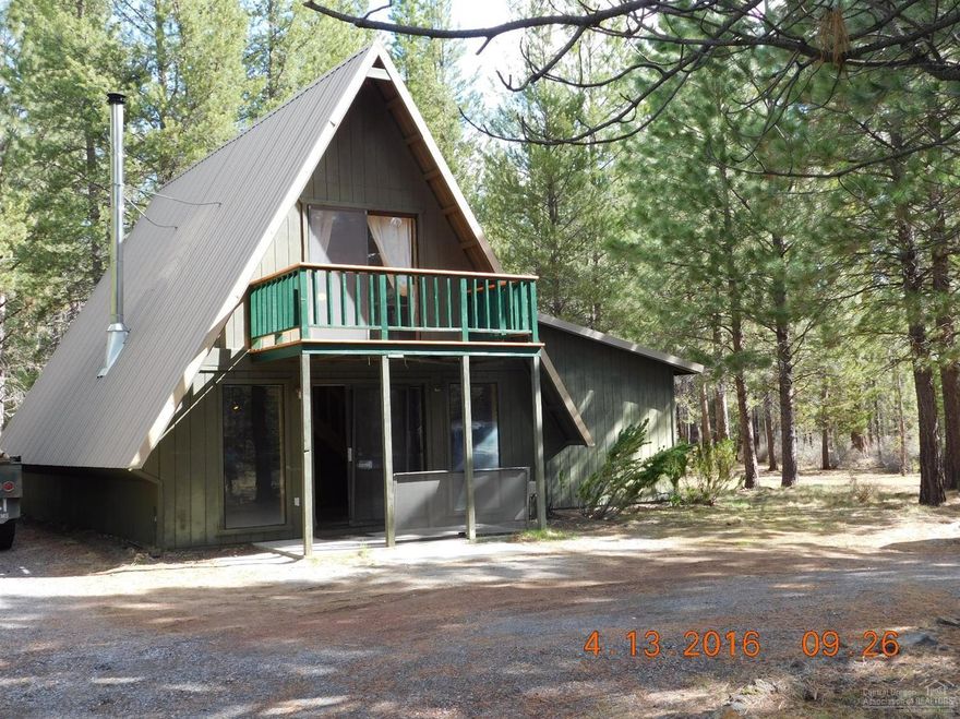 The perfect cabin in the woods. This is a David & David home with beautiful blue and buggy thru-out. Main bedroom downstairs was added in 1990 with full bath and laundry within steps & patio door out to private deck. 2 additional bedrooms with a half bath upstairs, 3rd bedroom has closet but not a door, more of a loft bedroom. This home has charm thru-out, 2 car garage with 1 door, dog kennel with inside area and storage space. Surrounded by large Ponderosa Pines close to all Central Oregon has to offer!