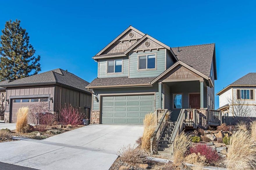 Gorgeous two-level home on a beautiful hill top setting. Towering ponderosa pines, lush landscaping, and extra wide lot pull together to form secluded and peaceful living. Extensively upgraded with slab granite throughout, hand troweled walls, chef's kitchen, whole house fan, and custom landscape package. Home is light/bright with open floor plan and dramatic floor to ceiling rock fireplace. Convenient location with easy access to Hwy 97.