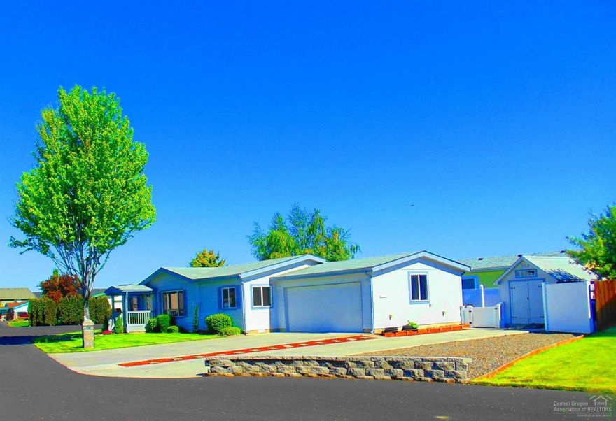 Pride of Ownership shows in this lovely 3 bedrooms, 2 full baths, home located Desert Meadows. Enjoy Cathedral ceiling and open floor plan in this light and bright home. Large kitchen boasts lots of cabinets, and eat in Kitchen. Attached double car garage with door opener. Extra parking to Park your boat or RV with 220 electric. Nice Large Shed for extra storage. White vinyl fencing encloses the private landscaped back yard with paver patio. All located on quiet Cul De Sac. HOA dues include domestic water & sewer. Close to shopping and Hospital!