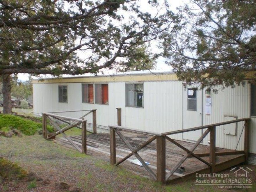 Located in the Round Butte Recreation Area just above Lake Billy Chinook where views, peace and quiet abound! This comfortable single-wide home comes with 3 bedrooms and 2 baths, nice kitchen area with oven/range, dishwasher and refrigerator and a large covered back patio.