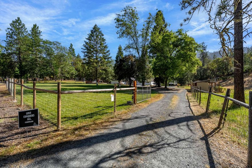 Welcome to the perfect blend of modern comfort and country living! This beautifully remodeled home sits on over 2.5 acres, offering plenty of privacy while only a few minutes from town. Step inside to discover a thoughtfully updated interior featuring fresh finishes, new flooring, modern fixtures, and a bright, open floorpan. A tasteful remodel in 2024 added 480 SQFT of living space, including an office, bedroom, storage, and second living room. The remodel incorporated a new HVAC system, upgraded to accommodate the extra square footage. Additionally, the pellet stove and heated tile floors in both bathrooms will keep you cozy in the winter. Outside, the possibilities are endless! Whether you envision a hobby farm, garden, workshop, or room for animals, this property delivers! There's an RV pad with power and water, a chicken enclosure, a 10x20 shed built in 2024, and a good well and in-ground sprinkler system to take care of your irrigation needs. Schedule your appointment today!