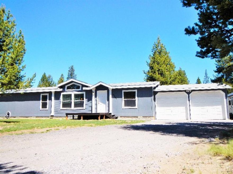 Beautiful immaculate home with private serene setting. New carpet(2015), new kitchen counters and tile backsplash(2015), with laminate wood floors in living room, also newer exterior paint as of 2013. Open floor plan that is light & bright. This manufactured home is move in ready in a beautiful well taken care of neighborhood in Lazy River South Subdivision. It had RV parking on the side with a loop driveway for convenience. Only 2 miles from Quail Run Golf Course. This gem won't last long!