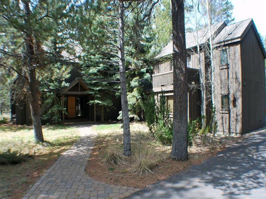 One of a kind property located on South end of Sunriver, close to the Resort & SHARC. On tow lots a main home & an apartment. Main house has 5 bedrooms, all upstairs. Main floor has room for everyone to spread out. Updated kitchen w/ granite & stainless invite large family gatherings. Separate living, family game areas. Across the breezeways is the garage w/ apartments. Bunkroom downstairs & king master up with sitting area & kitchenette. 2 car garage. Garage deck. 2 bedrooms are in a detached living area.