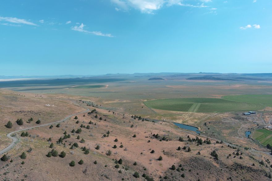 Are you ready to sow the seeds of success and embark on a journey that could redefine your future in agriculture? Picture this: a sprawling, prime agricultural gem spanning an impressive 778.72 acres of 
fertile farmland, just waiting for your innovative vision to take root and flourish. This isn't just any piece of land—it's a versatile powerhouse designed for modern farming, sustainability, and even recreational bliss, all nestled conveniently near the charming town of Paisley, Oregon. Let's start with the heart of this operation: 340 acres dedicated to premium alfalfa, thriving under state-of-

the-art pivot irrigation systems that ensure reliable, high-quality yields year after year. On average, you're  looking at a robust 5-6 tons per acre, but with dedicated care—optimal watering, timely harvesting, andnutrient management—you can push that to 7 tons or more per acre. Imagine the possibilities: bountiful harvests that