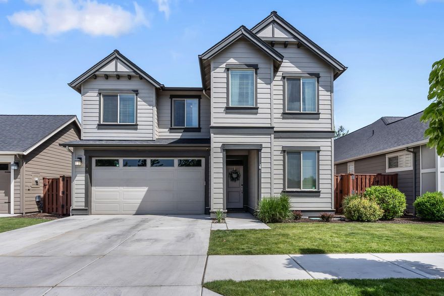 Fantastic 2,771 sq.ft. home in the desirable Ochoco Pointe neighborhood! This Pahlisch Home boasts quality finishes like quartz countertops, under-mount sinks, and laminate wood flooring. The open floor plan, bonus room (or 5th bedroom), and large kitchen island with matching quartz entertaining bar make it perfect for hosting family and friends. Enjoy three full bathrooms, a large covered patio, and a beautifully landscaped yard. The large laundry room and master suite with walk-in shower, soaking tub, and walk-in closet add a touch of luxury. Work from home in the office or use it as a mother-in-law suite with a large walk-in tiled shower that is handicap accessible. Neighborhood amenities include a swimming pool, park, play area, sport court, walking path to protected wetlands, and access to public BLM trails. Assumable VA loan at 2.29%, must qualify. Don't miss out on this amazing opportunity!