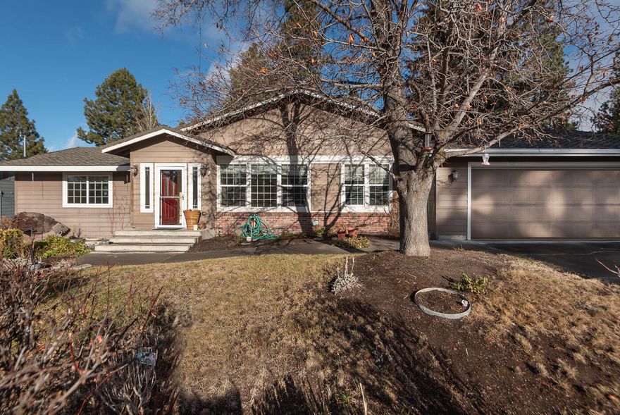 OPPORTUNITY KNOCKS!  
So many options in this sprawling midtown ranch, with tons of square footage on the main level, almost 900sf upstairs and small daylight basement (352 finished sf + unfinished area and util).  Fenced and landscaped and sitting on the coolest part of Quimby, right across from Goodrich Park.  Centrally located and a quick jaunt to medical, shopping, midtown fun, downtown Bend, you name it.